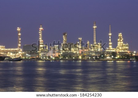Oil and gas refinery at twilight - Petrochemical factory.