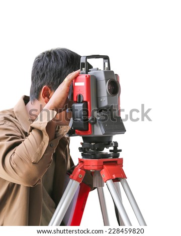 Surveying measuring equipment level theodolite on tripod at construction site.
