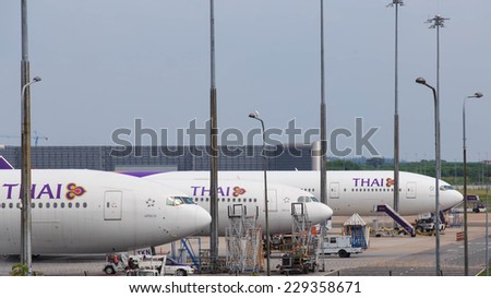 BANGKOK,THAIILAND-NOV 2:An aircraft parking at Suvarnabhumi Airport international airport on November,2014 in Bangkok,Thailand.Th is airport is handling about 45 million passengers annually