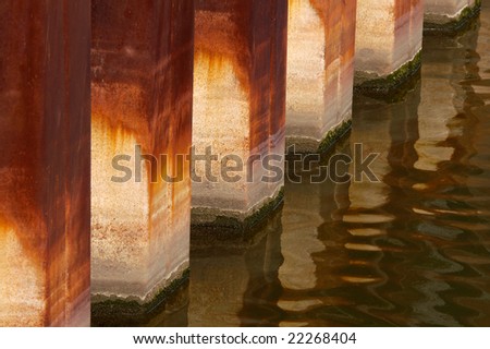 Base of a pier with oxidation from water