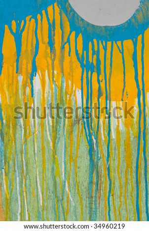 Abstract spattered yellow and blue paint drips down cracked wood background texture