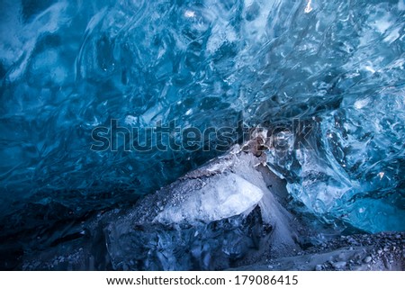 Various ice patterns and hues of blue in glacial ice in a remote area of Alaska