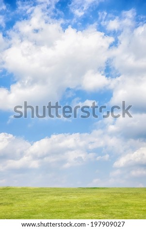 green hill with blue cloudy sky in sunny day