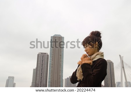 Young woman wearing scarf