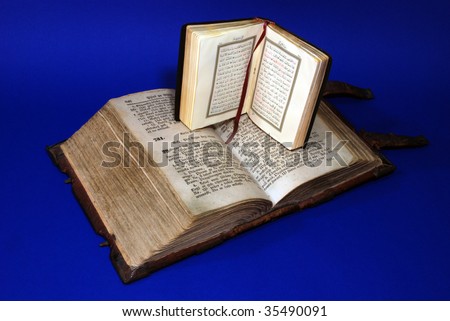 Ancient copy of the The Holy Bible and the Koran