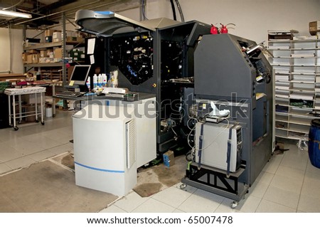 Digital press printing in printshop. Digital press printing is the reproduction of digital images on a physical surface.