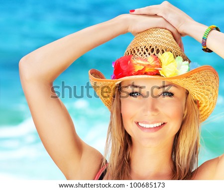 Happy young woman on the beach, beautiful female face outdoor portrait, pretty healthy girl relaxing outside, nature fun and joy, spa and travel concept