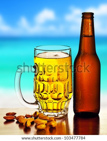 Cold beer on the beach, refreshing alcoholic drink with nuts mix, food and beverage still life, outdoor cafe,  summer leisure, vacation travel and fun concept