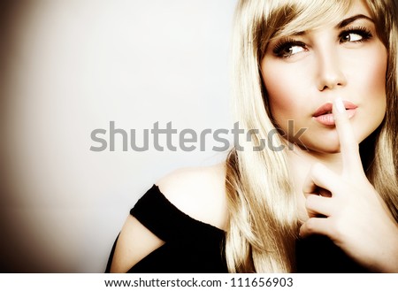 Photo of attractive woman expression silent, picture of mysterious girl show hush gesture, closeup portrait of young mum sign shh, image of blonde female with finger near lips, concept of silence