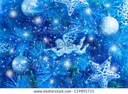 Picture of blue Christmas tree background, Christmastime fir decorations, star, bauble and angel decorated holiday spruce, happy New Year greeting card, xmas celebration, abstract wallpaper