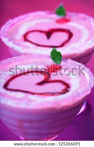 Image of tasty sundae with red romantic heart shape on the top, Valentine day holiday party, strawberry creamy smoothie with mint, nonalcoholic milk cocktail, cold ice cream, love concept