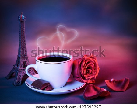 Image of morning coffee decorated with small eiffel tower and fresh red rose flower, cozy cafe in Paris, romantic travel, Valentine day, Europe landmark, vacation for honeymoon, love concept