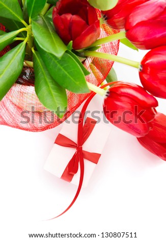 Photo of festive border, red fresh tulips bouquet in the pot, small white gift box with red ribbon, isolated on white background, home decoration, floral bunch for mothers day, romantic holiday