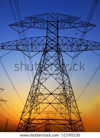 Electricity Pylon against blue sky. Environmental damage
