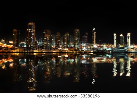 Dubai downtown at night reflected in water