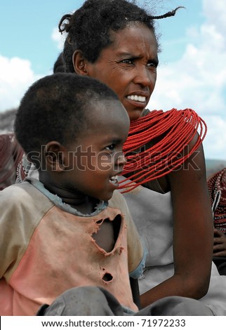 KENYA, AFRICA - NOVEMBER 8: A woman with her child, typical daily life of local people, near Samburu National Park Reserve, on November 8, 2008 in Kenya, Africa