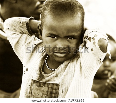 stock-photo-kenya-africa-november-portrait-of-an-unidentified-african-kid-of-samburu-tribe-village-posing-71972266.jpg