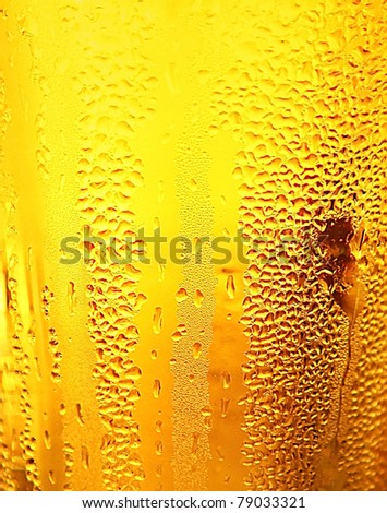 Abstract beer background with water drops