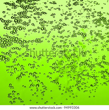 Abstract beer background, green Irish alcohol with bubbles, texture and pattern of drink, traditional brew for st.Patrick\'s day holiday celebration, lucky clover beverage