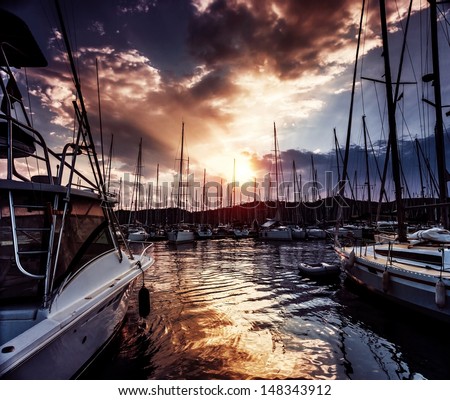 Yacht Port On Dramatic Sunset Background, Mysterious Cloudscape, Active Lifestyle, Luxury Water Transport, Summer Sport, Travel And Tourism Concept