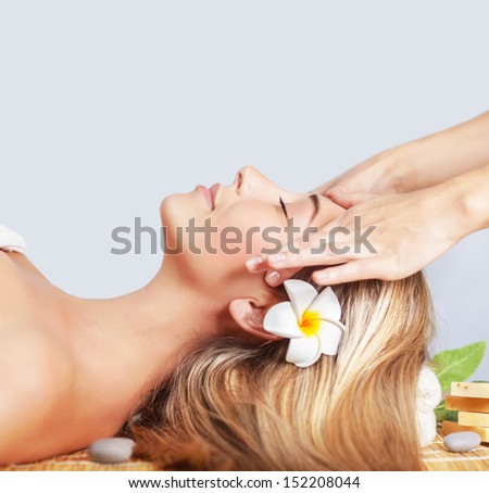 Closeup On Beautiful Blond Woman Lying Down On Massage Table, Side View, Professional Masseur, Luxury Spa Salon, Relaxation And Pleasure Concept