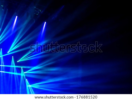 Blue stage light, abstract background, illuminated dance club, night performance, laser illumination, luxury rock concert projector