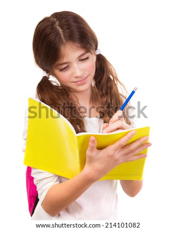 School girl writing in notebook isolated on white background, passing exam, learning interesting lesson, back to school concept