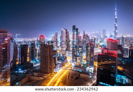 Beautiful night city, cityscape of Dubai, United Arab Emirates, modern futuristic architecture nighttime illumination, luxury traveling concept