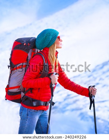 Happy skier girl enjoying view on beautiful mountains covered with snow, active lifestyle, luxury ski resort, winter sport concept