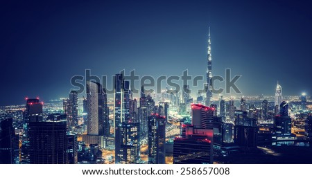 Beautiful Dubai cityscape, bird\'s eye view on a night urban scene, modern city panoramic landscape, United Arab Emirates