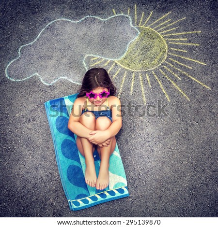 Cute little baby girl having fun outdoors, drawing on asphalt sun and tanning under it, happy childhood in summer camp, active summertime holidays
