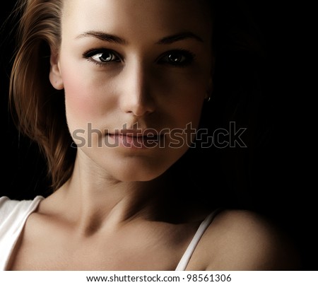 Glamor woman dark face portrait, beautiful female isolated on black background, stylish sexy look, young lady studio shot