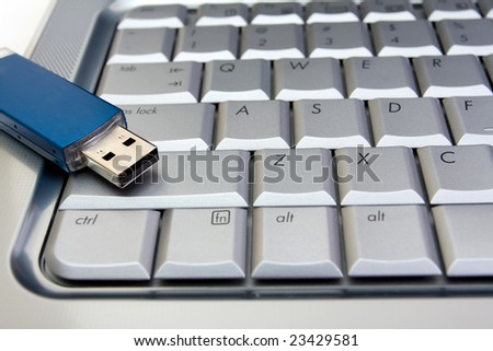 usb flash drive on keyboard