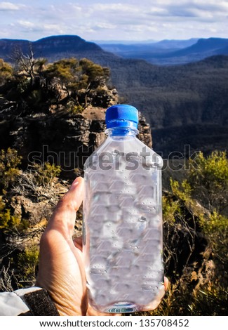 Drinking water with the mountain view