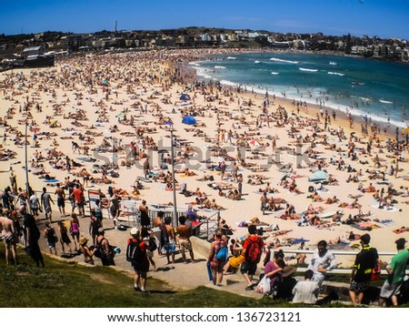 SYDNEY -JANUARY 1: People relaxing on the beach to celebrate new year on 1 January 2013 at Bondi beach in Sydney, Australia.Bondi beach is one of the most famous beach in the world.