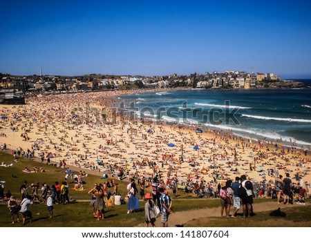 SYDNEY-JANUARY 1: people relaxing on the beach to celebrate new year on 1 January 2013 at Bondi beach in Sydney,Australia.Bondi beach is one of the most famous beach in the world.