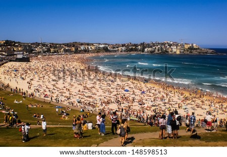 SYDNEY-JANUARY 1 :People relaxing on the beach to celebrate new year on 1 January 2013 at Bondi beach in Sydney,Australia.Bondi beach is one of the most famous beach in the world .