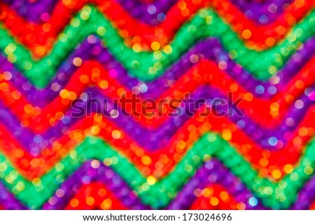 Blur version of colorful crocheting pattern .
