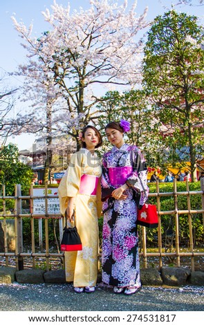 TOKYO,JAPAN-APRIL 2 : Japanese girls wore yukata for  join Hanami festival in Tokyo,Japan on  April 2,2015.Hanami festival will start when cherry blossom full bloom.
