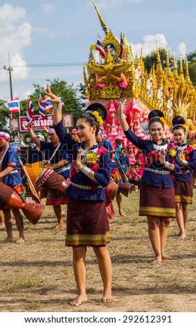 MAHASARAKHAM,THAILAND - MAY 31 : Thai group performing Thai music and Thai dancing in Rocket festival  on May 31,2015 .This festival for agriculture  to celebration the raining season.