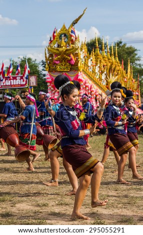 MAHASARAKHAM,THAILAND - MAY 31 : Thai group performing Thai music and Thai dancing in Rocket festival  on May 31,2015 .This festival for agriculture  to celebration the raining season.