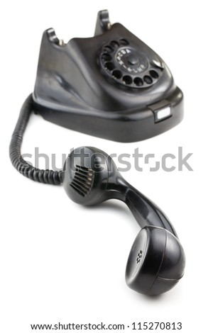 antique black phone on white background