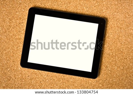 the touch tablet on cork board