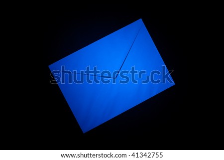 closed envelopes with blue spot light on black background