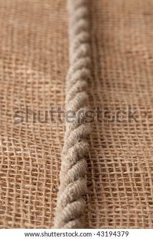 detail of rope laying on jute