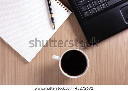 coffee cup and computer - break in office