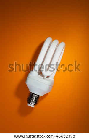fluorescent light bulb on color background