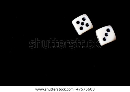 two dice on black background