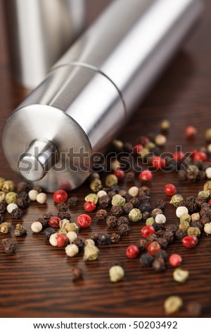 pepper mill on wooden table