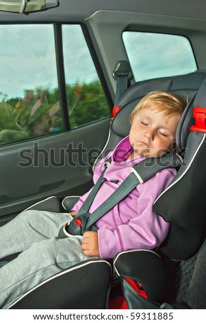 sleeping child in car seat
